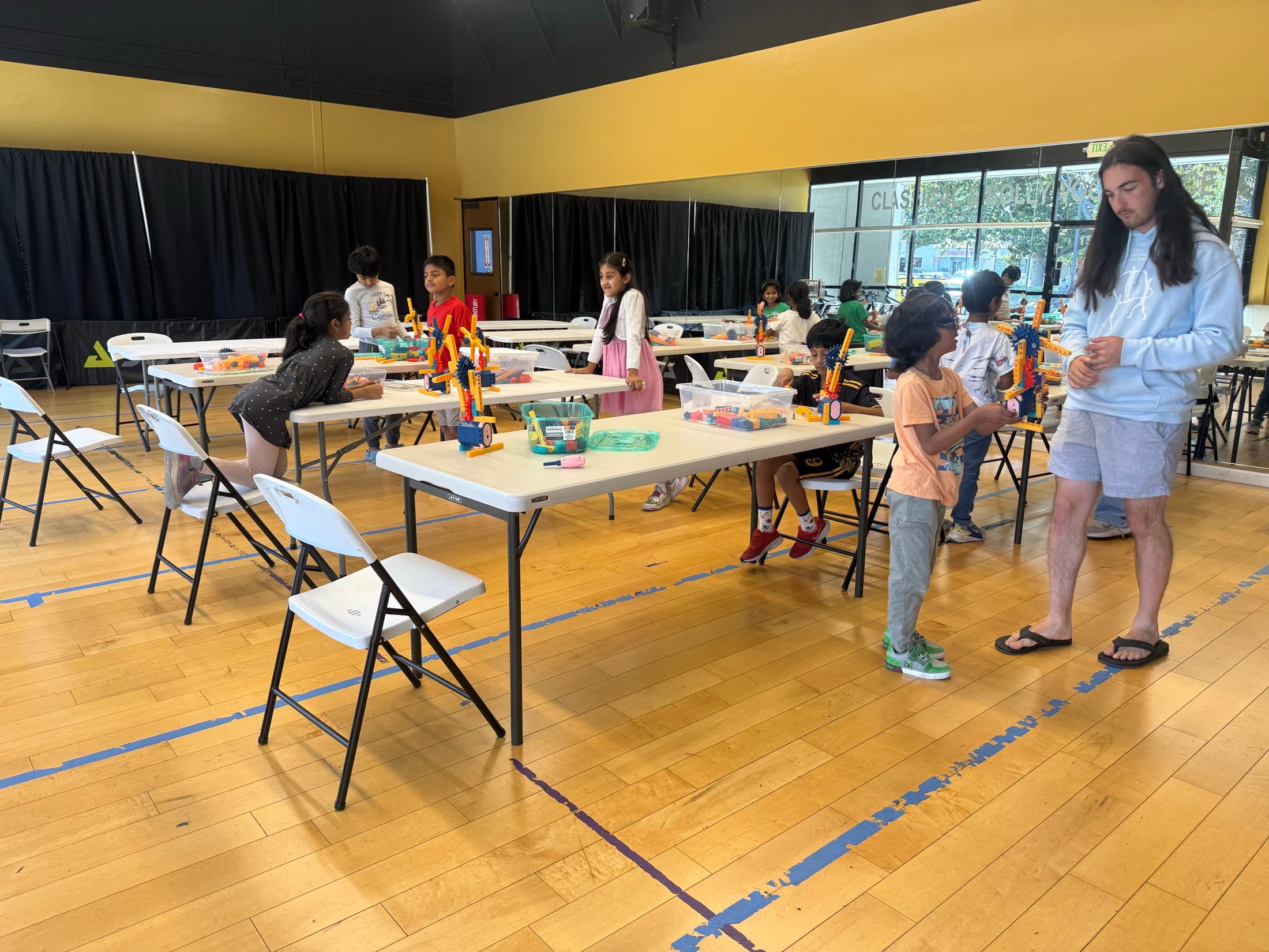 Children learning together in a bright activity space