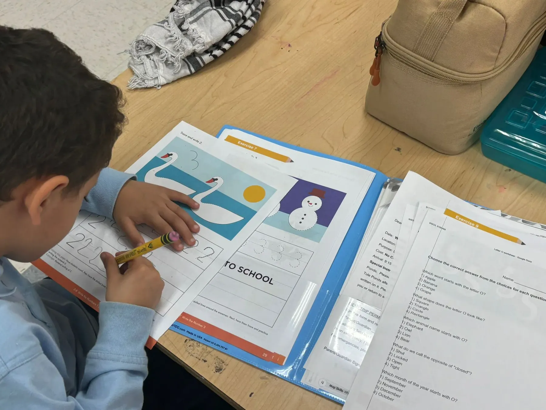 A child practicing writing during focused homework time